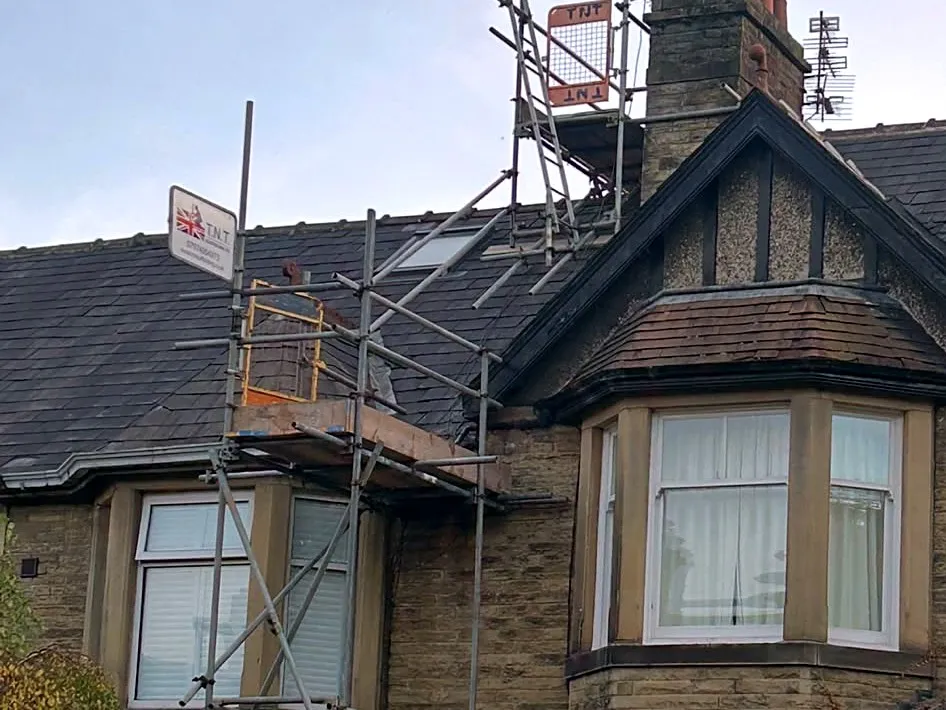 Chimney access scaffold on a domestic roof