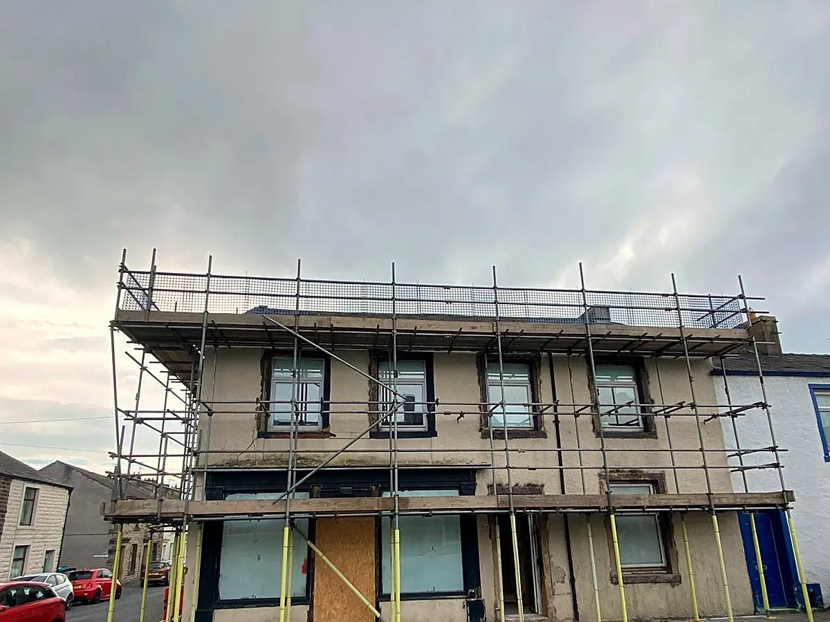 Roof-level scaffold on a commercial property